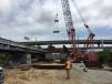 Crews assemble the steel bridge superstructure.
 