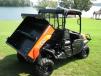 An orange Sidekick is on display at Lake Lanier’s picturesque Pinelsle Point. The Kubota Sidekick comes in four colors: orange, camouflage, green and black paint schemes. 