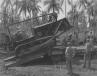 Seabee load a bulldozer onto a lowboy trailer on Guadalcanal in February 1945.
(U.S. Navy Seabee Museum photo) 