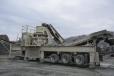 From the Superior surge bin, materials are sent to the Metso HP400 chassis mount cone crusher.