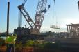 The crane gets to work on the bridge overhaul project.