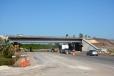 Work includes construction of bridges over County Road 100A and County Road 229.