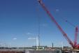 A Manitowoc 650-ton crane with a 340-ft. boom will be used for the arch erection. 
(© 2019 Iowa DOT) 