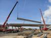 The primary tasks remaining involve completing the overpass, including girder placement and pouring the deck, as well as building more than 1 mi. of new pavement north and south of the overpass.
(ADOT photo) 