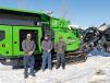 (L-R): Dan Brzozowski, David Bailey, and Delton DeMarce of the Ruffridge-Johnson EvoQuip Equipment Company service staff stand in front of one of the big EvoQuip machines for which they are responsible. 
 