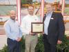 (L-R) are Bryan Beck, GOMACO Southwest United States district manager; David Barthel, Faris Machinery; and Kent Godbersen, GOMACO vice president of worldwide sales and marketing. 