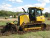 One of the first dozers dispatched to the site for earthmoving was a Deere 650K.