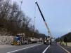 Crews install a concrete barrier rail to accommodate two lanes of traffic on I-24.
(TDOT photo) 