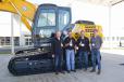 Raymond Riter, Mike Jones, Jim Riter and Jimmy Riter of A Crano Excavating purchased the SK210LC-10 from Kobelco dealer, Southeastern Equipment.
 