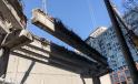 Cranes remove a girder from a section of the old Columbia Street on-ramp to southbound SR 99.
(Washington State DOT photo) 