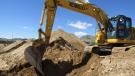 R&J Utility uses a Kobelco SK230 excavator to dig a sewer service trench for a new home at Verrado, Ariz.
 