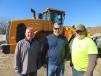 Discussing Kohler Pit’s Hyundai HL 960 wheel loader (L-R) are Ed Harseim, district sales manager, Hyundai Construction Equipment Americas Inc.; Jon Christine, Yes Equipment & Services Inc.; and Jim Farrell of Kohler, the machine’s operator.
