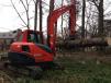 This Kubota KX080-3 with a thumb attachment is ideally equipped for loading logs.