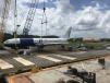 通过驳Mobro海洋运送飞机严重受损的绿湾温泉船厂由美国国家运输安全委员会进行检查。