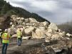 The Colorado Department of Transportation said trucks are hauling away fragments of the 1,150-ton (1,047-t) rock from state Highway 145 while workers build a temporary bypass.
(CDOT photo)
