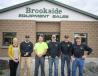 Some of the Brookside Equipment Sales team stand in front of their location at 60 State Road in Phillipston, Mass. (L-R): Michelle Putnam, account and office manager; Matt McHugh, export and sales; Eric Jakubowicz, buying and sales; Kevin McHugh, inventory and marketing manager; Roger McHugh, owner and sales; and Dan McHugh, owner and buying.