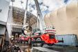 Tandem RTC-8050 cranes complete a lift at Nichols Bros. Boat Builders. 