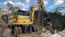 An MB-G900 is attached to a New Holland MH36 for a wood environmental remediation project. 