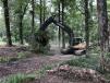 On the lot-clearing side of its business, Sitton Construction uses the versatile Volvo EC220D excavator to bring down small trees and brush.