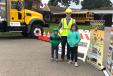 Charlie Walsh, pictured here with his son Drew and daughter Catherine on the right during a “Touch a Truck” event at their school. 