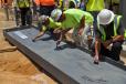 In July, every construction pit crew member of Hoar Construction signed the final steel beam that was erected and put into place as the last piece of the new Open Air Social Club.