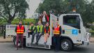 The Yarra City Council intends to use the electric tipper for hard rubbish collections and is exploring how to transition to electric garbage and recycling trucks over the next five years. (L-R) are: Peter Moran; Austin Philips; Glen Walker; Danae Bosler; Chris Leivers; and Joe Agostino (standing on truck).  
 