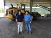 Territory Manager Johnnie Brown (Southeastern North Carolina) of Ascendum Machinery and Plant Manager Scott King of Mirimichi Green. 