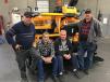 Posing with the LeeBoy 8515E paver at the factory in North Carolina before it shipped (L-R) are Keith Lee, Tommy Weese, Eric Lee and Mike Lee.