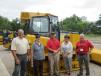 (L-R): West Side Tractor Sales Co. President Steve Benck; Gail Brubacker of Rieth-Riley; Brian Levenhagen of West Side Tractor Sales Co.; Vickie Brindley of Rieth-Riley; and West Side Tractor Sales Co. Sales Manager Tom Stern at an open house in 2012.
 