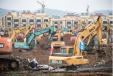 China State Construction Engineering, one of the companies building the hospital, said it is “doing all it can and would overcome difficulties” to play its part, adding it has more than 100 workers on the site. Building machinery included 35 diggers and 10 bulldozers. (Xinhua News Agency/PA Images photo) 