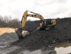 One of Black Rock Crushing’s Cat 330F excavators goes to work. 