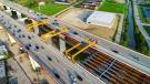 Gantry crane system works to set a steel girder across span 5.
(ODOT photo) 