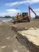 To restore areas that experienced significant erosion during the March 2019 flood event, the work process requires excavating the damaged location until a solid base to build upon can be established.
(USACE — Omaha District photo)