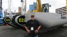 Eric Dupee of Remu USA, Old Orchard Beach, Maine, exhibits his company’s amphibious excavator, the Remu E22. 