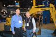 George Lumpkins (L) of Kobelco gave Atlas Machinery’s Larry Dupaix a rundown of the company’s most current product line during ConExpo. Atlas Machinery sells and rents equipment in Salt Lake City. 