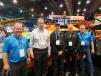 LeeBoy introduced the Leeboy 8530 paver at ConExpo and representing LeeBoy (L-R) are Bryce Davis; Chris Barnard, president; and Mike Lee, Eric Lee and Tommy Weese, all of the R&D department and family members of the Lee family. 