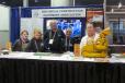 Members of the Historical Construction Equipment Association, including Tom Berry (third from L), enjoyed discussing vintage iron with ConExpo 2020 attendees. 