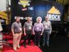 (L-R): IROCK Crusher LLC’s John Patton, Eric Dombrowski, Dan Davis and Ken Taylor reviewed the company’s conveyors, crushing plants and screening plants with attendees at the show. 