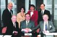 In March 1995, Hoffman International signs the agreement with the Road Ministry of the Russian Federation (the minister is seated in the center) to proceed with the contract to sell road maintenance equipment resulting in more than $10 million (U.S.) in sales.