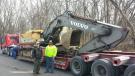 Mike Randazzo and Louis Sanzaro with their Volvo excavator, one of the centerpieces of their equipment fleet.