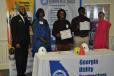 GUCA Work Ready Graduates James Ross and Francis Kwafo, received their Certificate of Completion and Safety Certifications, with Connecting Henry Staff. 