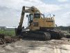 A Komatsu 228 excavator is on site for bridge work.
(ODOT photo)