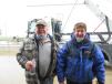 Ray Sullivan (L) of McCann Industries and Robert Griffith braved the weather to see the Bucher CityCat 5006 in action.

