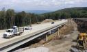 With the highway now open to motorists, crews are working to complete construction efforts on U.S. 231 near Huntsville, Ala., nine months after a landslide caused major damage. 
