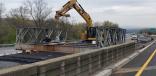 Crews build the temporary roadway in the I-78 median.