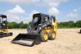 Skid steers are great on harder surfaces like concrete and asphalt, especially when equipped with hard tires.