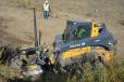 A John Deere 331G track loader with Level Best grading attachment and Topcon 3D-MC grade control software works on reclaiming a creek bed on the Vermejo Park Ranch in New Mexico. 