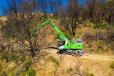 Removing burned out trees from wooded areas is an ideal job for Atlas’ 718.