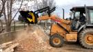 In Bulgaria, a company installed an MB-L160 crusher bucket on a Case backhoe loader to demolish an old house. 
