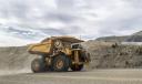 Representing the Caterpillar fleet of autonomous trucks, the displayed Cat 794 AC electric drive will be factory-installed with Cat MineStar Command for hauling.  